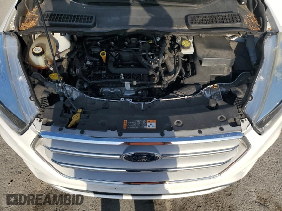 2019 Ford Escape SE z VIN 1FMCU9GD9KUA02481, wystawiony jako Copart lot #57919925 z przebiegiem 63 874 mil mil oraz Czysty tytuł • Clean title. Historia ofert i sprzedaży dostępna na DreamBid. Obrazek 12.