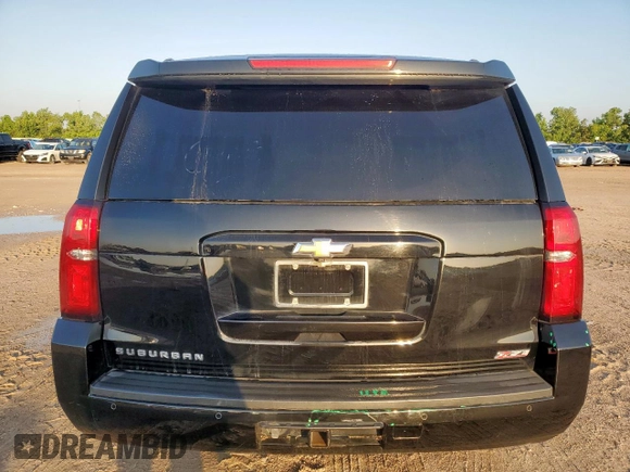 2020 Chevrolet Suburban LT with VIN 1GNSKHKC9LR102624, listed as a Copart auction lot 58970995 with 76,132 mi miles and Salvage title. Bid and sale history available at DreamBid. Image 6.