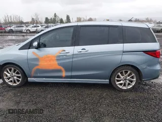 2013 Mazda 5 Grand Touring z VIN JM1CW2DL2D0153982, wystawiony jako IAAI lot #41857697 z przebiegiem 98 053 mil mil oraz . Historia ofert i sprzedaży dostępna na DreamBid. Obrazek 6.