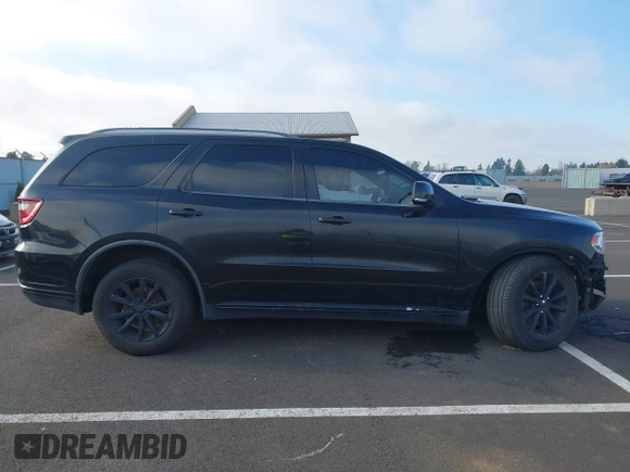 2014 Dodge Durango Limited with VIN 1C4SDHDT2EC405671, listed as a IAAI auction lot 39442398 with 154,469 mi miles and . Bid and sale history available at DreamBid. Image 12.