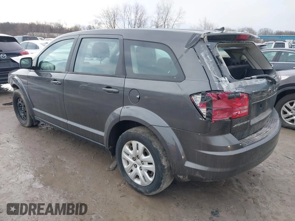 2015 Dodge Journey American Value with VIN 3C4PDCAB5FT557177, listed as a IAAI auction lot 41726815 with 142,658 mi miles and . Bid and sale history available at DreamBid. Image 3.