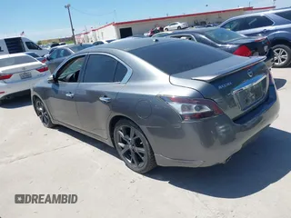 2014 Nissan Maxima SV z VIN 1N4AA5AP1EC440170, wystawiony jako IAAI lot #42837930 z przebiegiem 100 309 mil mil oraz . Historia ofert i sprzedaży dostępna na DreamBid. Obrazek 3.