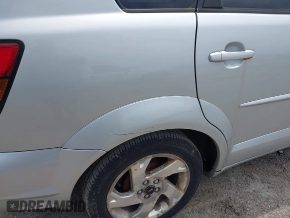 2005 Pontiac Vibe with VIN 5Y2SL63805Z411017, listed as a IAAI auction lot 42688944 with 215,361 mi miles and . Bid and sale history available at DreamBid. Image 12.