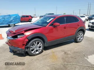 2021 Mazda CX-30 Premium with VIN 3MVDMBDL1MM314747, listed as a Copart auction lot 56669495 with 26,052 mi miles and Salvage title. Bid and sale history available at DreamBid. Image 1.