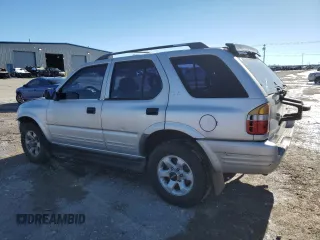 1999 Isuzu Rodeo S with VIN 4S2CK58WXX4373485, listed as a Copart auction lot 87804995 with 246,518 mi miles and Salvage title. Bid and sale history available at DreamBid. Image 2.