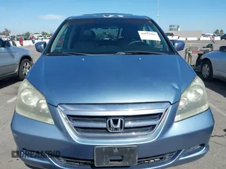2006 Honda Odyssey EX-L z VIN 5FNRL38706B075356, wystawiony jako IAAI lot #42021960 z przebiegiem 120 455 mil mil oraz . Historia ofert i sprzedaży dostępna na DreamBid. Obrazek 12.