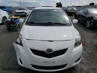 2010 Toyota Yaris with VIN JTDBT4K3XA1360659, listed as a Copart auction lot 51490475 with 210,967 mi miles and Salvage Title. Bid and sale history available at carsss.com. Image 5.