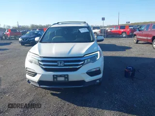 2017 Honda Pilot Elite with VIN 5FNYF6H00HB032386, listed as a IAAI auction lot 41976702 with 153,251 mi miles and . Bid and sale history available at DreamBid. Image 12.
