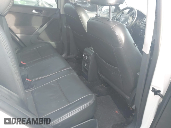 2013 Volkswagen Tiguan SE z VIN WVGAV7AX4DW555154, wystawiony jako IAAI lot #42200452 z przebiegiem 190 745 mil mil oraz . Historia ofert i sprzedaży dostępna na DreamBid. Obrazek 8.