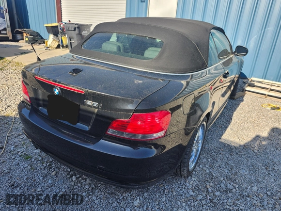 2010 BMW 1 Series 128i with VIN WBAUL7C52AVJ77448, listed as a IAAI auction lot 41886372 with 97,567 mi miles and . Bid and sale history available at DreamBid. Image 4.