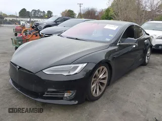 2018 Tesla Model S 75D with VIN 5YJSA1E24JF259874, listed as a IAAI auction lot 41921382 with 82,182 mi miles and . Bid and sale history available at DreamBid. Image 2.
