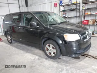 2013 Dodge Grand Caravan SXT with VIN 2C4RDGCG2DR527482, listed as a IAAI auction lot 42199622 with 198,248 mi miles and . Bid and sale history available at DreamBid. Image 1.