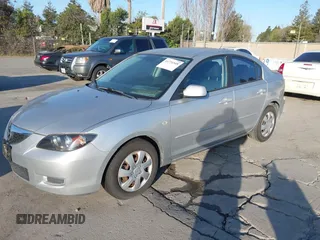2007 Mazda 3 i Sport with VIN JM1BK12F371721573, listed as a IAAI auction lot 41776548 with 152,317 mi miles and . Bid and sale history available at carsss.com. Image 2.