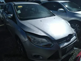 2013 Ford Focus SE with VIN 1FADP3F26DL235990, listed as a IAAI auction lot 41759160 with 120,715 mi miles. Bid and sale history available at carsss.com. Image 1.