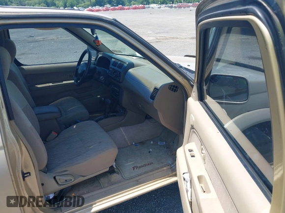 1999 Nissan Frontier XE with VIN 1N6ED26Y2XC321255, listed as a IAAI auction lot 42580192 with 147,006 mi miles and . Bid and sale history available at DreamBid. Image 5.