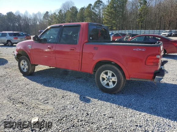 2002 Ford F-150 XLT with VIN 1FTRW08L92KD88745, listed as a Copart auction lot 41397555 with 211,116 mi miles and Salvage Title. Bid and sale history available at carsss.com. Image 2.