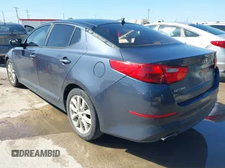 2015 Kia Optima LX with VIN 5XXGM4A71FG400128, listed as a IAAI auction lot 42106109 with 185,667 mi miles and . Bid and sale history available at carsss.com. Image 3.