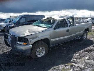 2000 GMC Sierra 2500 SLE z VIN 1GTGK29U7YE380284, wystawiony jako IAAI lot #41965443 z przebiegiem 189 831 mil mil oraz . Historia ofert i sprzedaży dostępna na DreamBid. Obrazek 2.