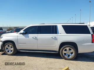 2016 Chevrolet Suburban LTZ with VIN 1GNSCJKC0GR135103, listed as a IAAI auction lot 41372158 with 167,540 mi miles and . Bid and sale history available at DreamBid. Image 14.