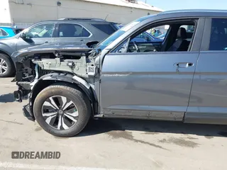 2024 Volkswagen Atlas SE z VIN 1V2LE2CA5RC225216, wystawiony jako IAAI lot #42156315 z przebiegiem 29 742 mil mil oraz . Historia ofert i sprzedaży dostępna na DreamBid. Obrazek 21.
