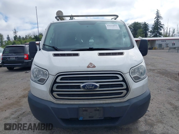 2015 Ford Transit Cargo with VIN 1FTNR1ZM6FKA34609, listed as a IAAI auction lot 42635875 with 214,750 mi miles and . Bid and sale history available at DreamBid. Image 12.