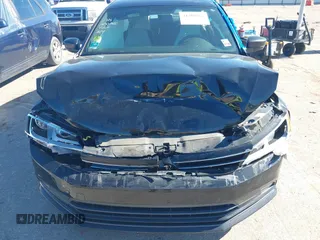 2015 Volkswagen Jetta SE z VIN 3VWD17AJ9FM415626, wystawiony jako IAAI lot #41309967 z przebiegiem 96 681 mil mil oraz . Historia ofert i sprzedaży dostępna na DreamBid. Obrazek 6.