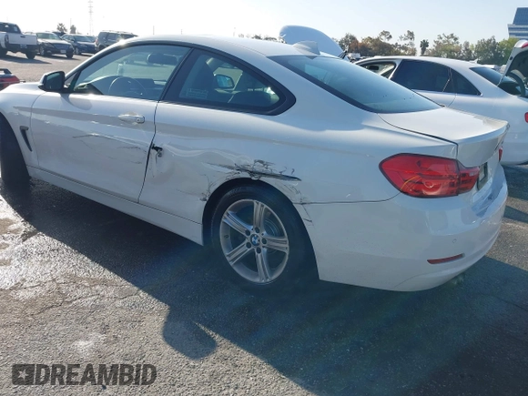 2015 BMW 4 Series 428i with VIN WBA3N7C54FK225367, listed as a IAAI auction lot 41958685 with 142,104 mi miles. Bid and sale history available at carsss.com. Image 3.