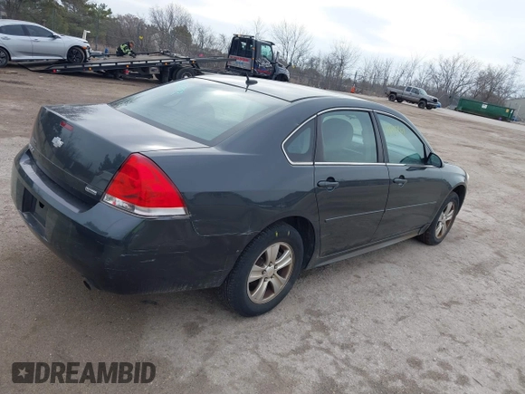 2014 Chevrolet Impala LS with VIN 2G1WA5E30E1125611, listed as a IAAI auction lot 41828292 with 141,826 mi miles and . Bid and sale history available at DreamBid. Image 4.