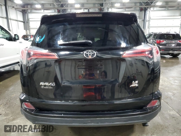 2018 Toyota RAV4 LE with VIN 2T3BFREV6JW763007, listed as a Copart auction lot 58604545 with 107,683 mi miles and Salvage title. Bid and sale history available at DreamBid. Image 6.
