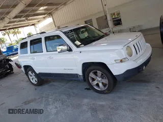 2014 Jeep Patriot High Altitude with VIN 1C4NJPFA1ED653402, listed as a IAAI auction lot 42371410 with 165,459 mi miles and . Bid and sale history available at DreamBid. Image 13.