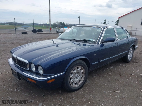 1998 Jaguar XJ with VIN SAJHX124XWC844575, listed as a IAAI auction lot 41951600 with 97,458 mi miles. Bid and sale history available at carsss.com. Image 2.