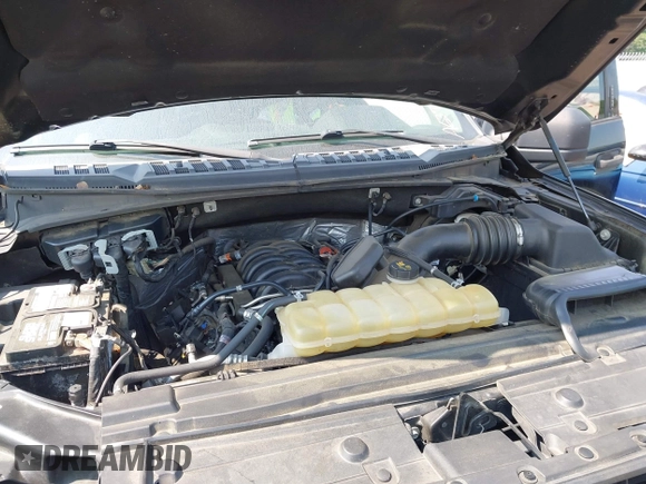2019 Ford F-150 XL with VIN 1FTEW1E56KFA63764, listed as a IAAI auction lot 42410872 with 124,648 mi miles and . Bid and sale history available at DreamBid. Image 10.