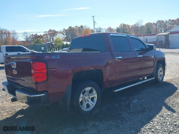 2015 Chevrolet Silverado 1500 LT with VIN 3GCUKREC6FG185646, listed as a IAAI auction lot 40702001 with 187,304 mi miles. Bid and sale history available at carsss.com. Image 4.