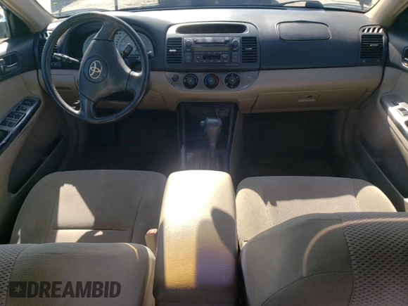2003 Toyota Camry LE z VIN 4T1BF32K63U559665, wystawiony jako Copart lot #52147645 z przebiegiem 322 212 mil mil oraz Szkoda całkowita • Salvage title. Historia ofert i sprzedaży dostępna na DreamBid. Obrazek 8.