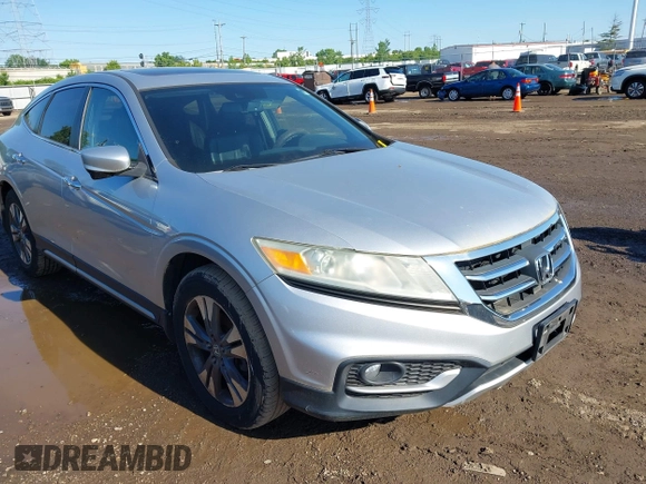 2013 Honda Crosstour EX-L z VIN 5J6TF2H56DL002499, wystawiony jako IAAI lot #42349382 z przebiegiem 174 542 mil mil oraz . Historia ofert i sprzedaży dostępna na DreamBid. Obrazek 1.