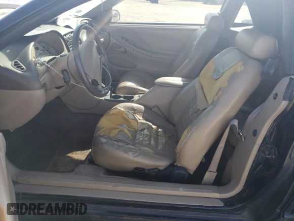 1999 Ford Mustang GT z VIN 1FAFP45X5XF224042, wystawiony jako Copart lot #52966565 z przebiegiem 145 862 mil mil oraz Szkoda całkowita • Salvage title. Historia ofert i sprzedaży dostępna na DreamBid. Obrazek 7.