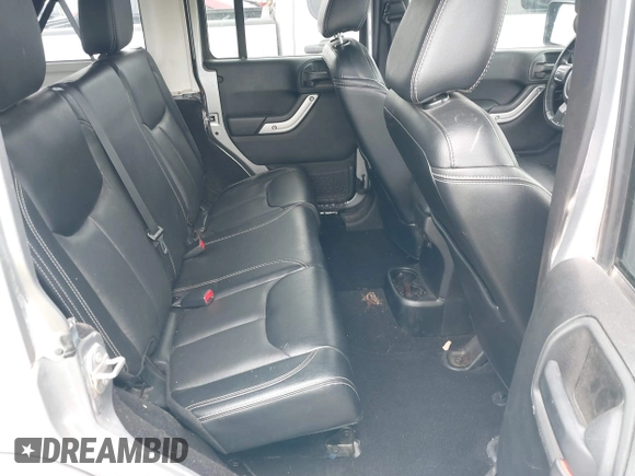 2016 Jeep Wrangler Unlimited Sahara z VIN 1C4BJWEGXGL280016, wystawiony jako IAAI lot #42620102 z przebiegiem 128 232 mil mil oraz . Historia ofert i sprzedaży dostępna na DreamBid. Obrazek 8.