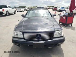 1999 Mercedes-Benz SL-Class with VIN WDBFA68F0XF182162, listed as a Copart auction lot 71390714 with 111,152 mi miles and Salvage Title. Bid and sale history available at carsss.com. Image 5.