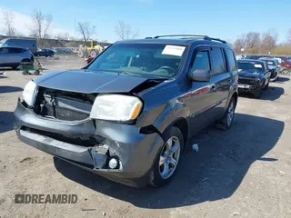 2012 Honda Pilot EX-L with VIN 5FNYF4H55CB040430, listed as a IAAI auction lot 41952800 with 247,175 mi miles and . Bid and sale history available at DreamBid. Image 18.