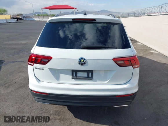 2020 Volkswagen Tiguan S with VIN 3VV1B7AXXLM036994, listed as a IAAI auction lot 42643035 with 62,676 mi miles and . Bid and sale history available at DreamBid. Image 16.