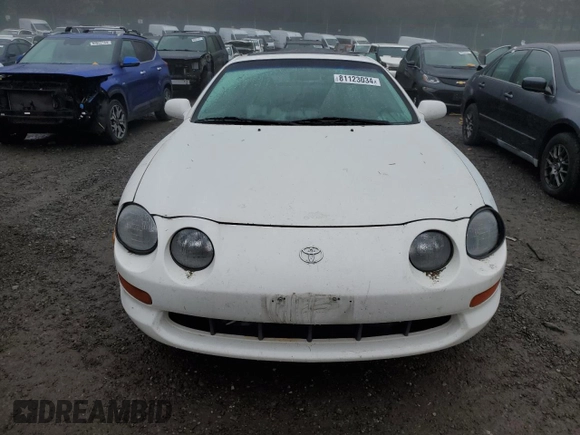 1995 Toyota Celica GT z VIN JT2ST07N6S0029662, wystawiony jako Copart lot #81123034 z przebiegiem 145 303 mil mil oraz Szkoda całkowita • Salvage title. Historia ofert i sprzedaży dostępna na DreamBid. Obrazek 5.