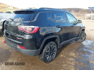 2019 Jeep Compass Trailhawk with VIN 3C4NJDDBXKT671364, listed as a IAAI auction lot 41655974 with 104,252 mi miles and . Bid and sale history available at carsss.com. Image 4.