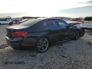 2020 BMW 5 Series M550i xDrive with VIN WBAJS7C01LCD23365, listed as a Copart auction lot 88302885 with Not provided miles and Salvage title. Bid and sale history available at DreamBid. Image 3.