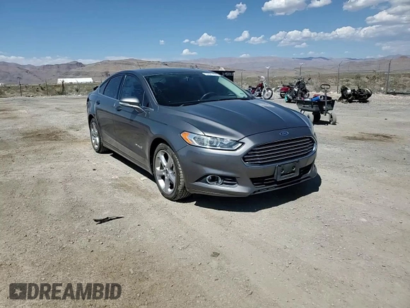 2014 Ford Fusion SE Hybrid with VIN 3FA6P0LU3ER306739, listed as a Copart auction lot 69887454 with 114,150 mi miles and Salvage title. Bid and sale history available at DreamBid. Image 11.
