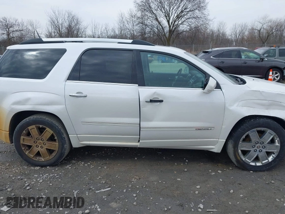 2016 GMC Acadia Denali z VIN 1GKKVTKDXGJ149164, wystawiony jako IAAI lot #41972627 z przebiegiem 158 397 mil mil oraz . Historia ofert i sprzedaży dostępna na DreamBid. Obrazek 13.