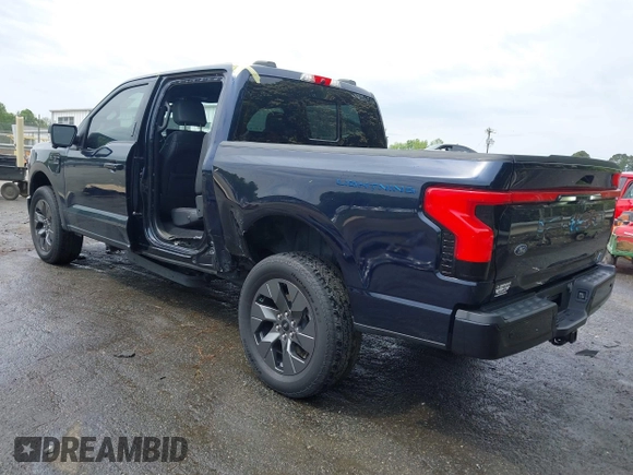 2023 Ford F-150 Lightning Pro with VIN 1FTVW1EL7PWG11924, listed as a IAAI auction lot 41991819 with 20,450 mi miles and . Bid and sale history available at DreamBid. Image 3.