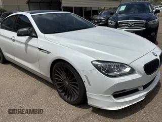 2015 BMW 6 Series 650i xDrive with VIN WBA6B4C57FD899926, listed as a Copart auction lot 54974505 with 63,570 mi miles and Salvage Title. Bid and sale history available at carsss.com. Image 1.