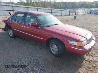 2000 Mercury Grand Marquis LS z VIN 2MEFM75W1YX736283, wystawiony jako IAAI lot #41879063 z przebiegiem 114 535 mil mil oraz . Historia ofert i sprzedaży dostępna na DreamBid. Obrazek 1.