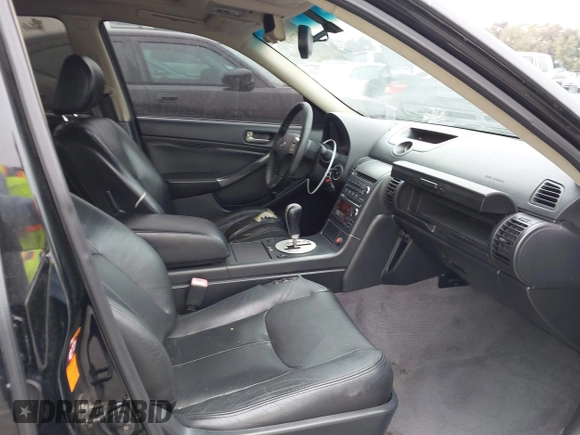 2004 Infiniti G35 w/Leather z VIN JNKCV51E44M114392, wystawiony jako IAAI lot #42477169 z przebiegiem 164 521 mil mil oraz . Historia ofert i sprzedaży dostępna na DreamBid. Obrazek 5.