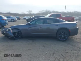 2019 Dodge Charger SXT with VIN 2C3CDXBG8KH668202, listed as a IAAI auction lot 41710007 with 72,640 mi miles. Bid and sale history available at carsss.com. Image 14.